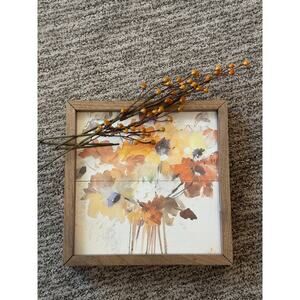 Orange flower wood decor with faux flowers